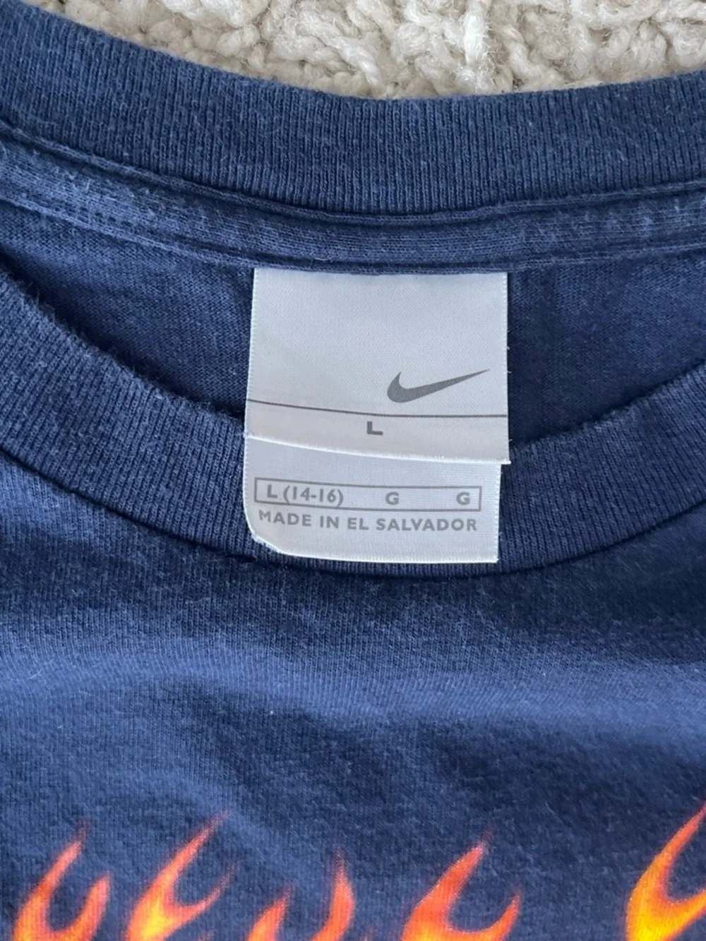 Vintage Nike Kids Navy Long Sleeve Tee with Flame 'Swoosh' Graphic